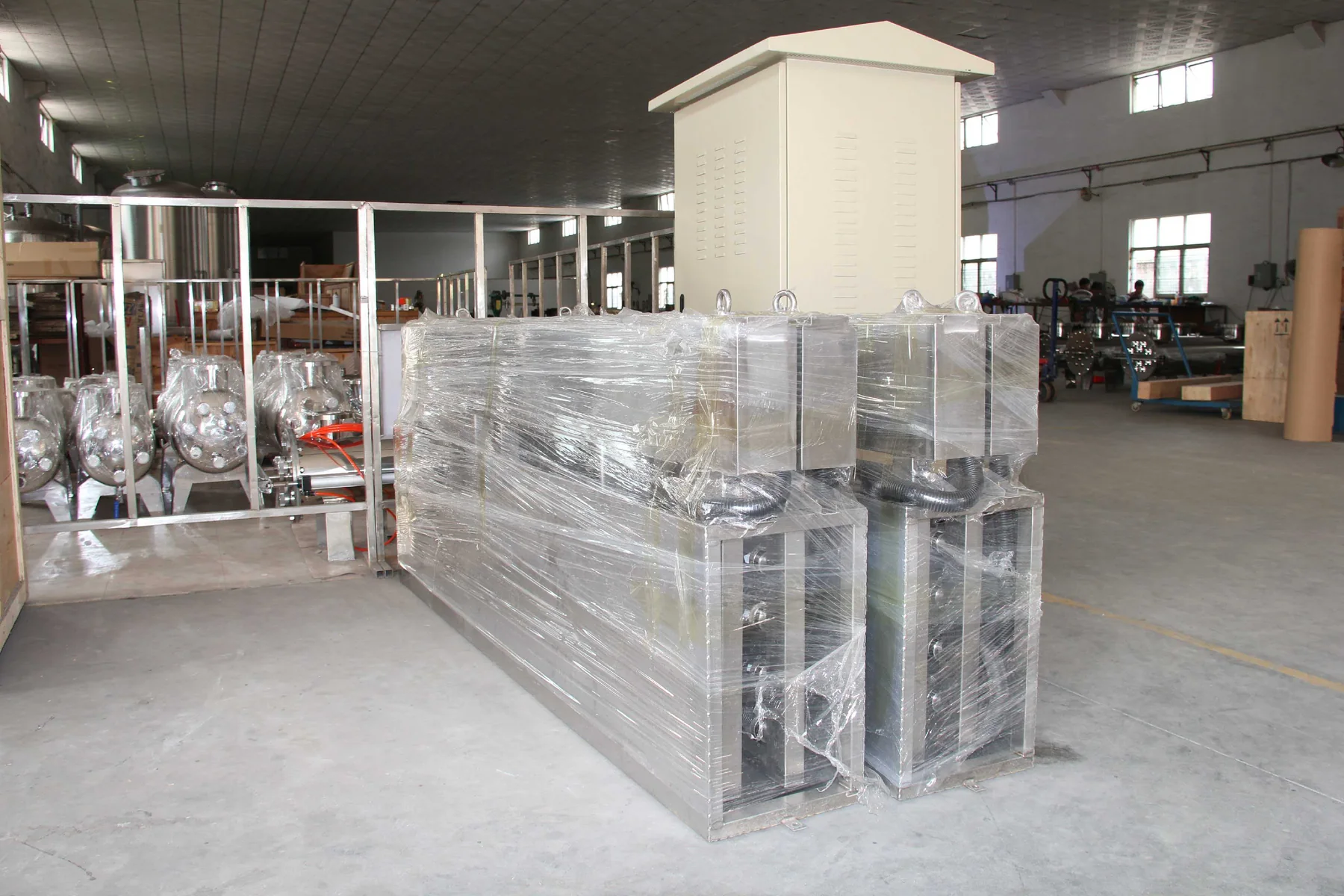 Pre-assembled water-treatment equipment on the KONCHE factory floor