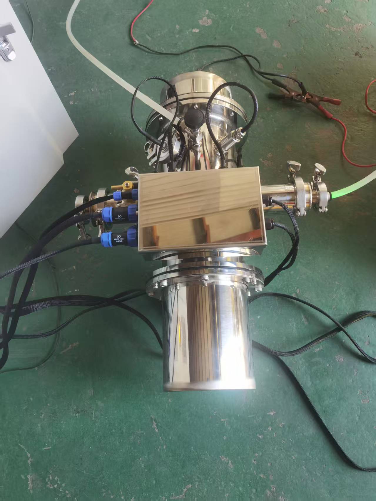 Factory photograph of the 1.8 kW medium-pressure UV reactor supplied for the 2025 hotel pool project