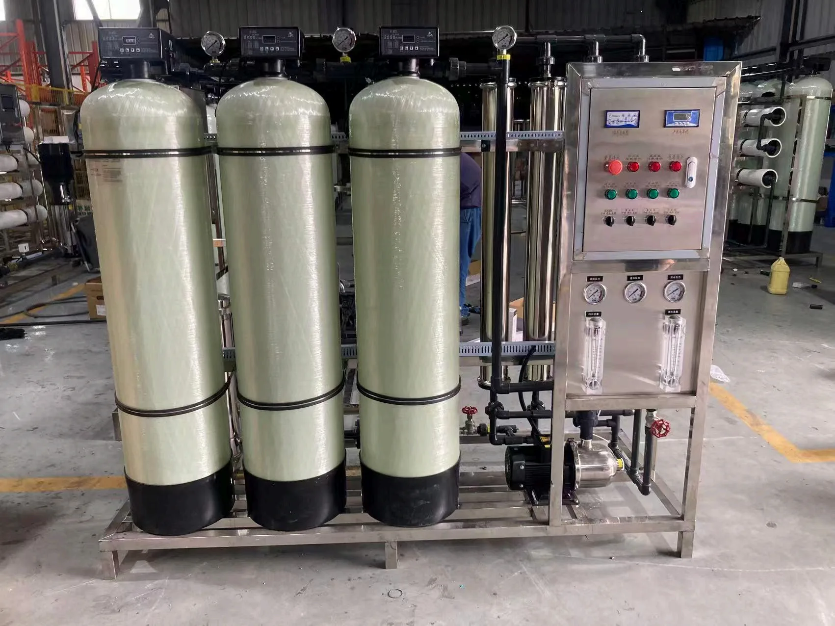 KONCHE compact industrial reverse osmosis equipment with three FRP pretreatment vessels and a stainless-steel RO control skid