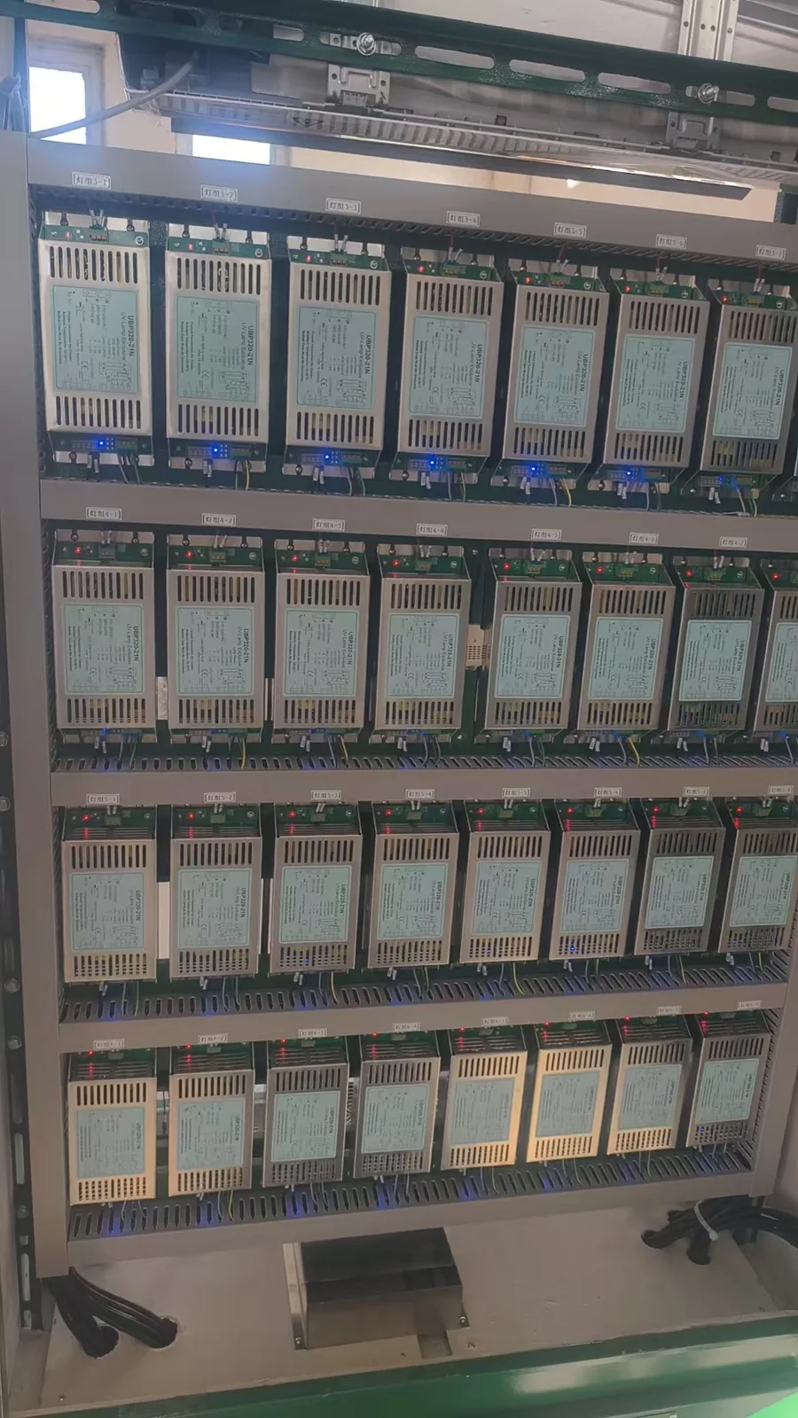 Electronic ballast arrangement inside a UV equipment cabinet.
