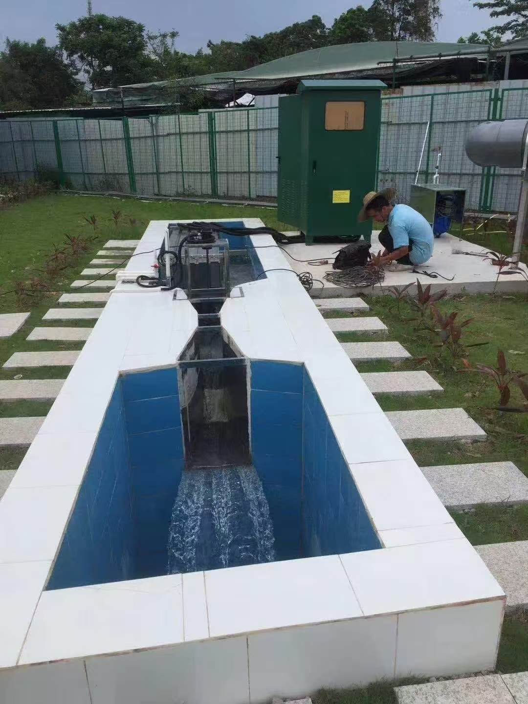 An open-channel UV module lifted for inspection beside its control cabinet
