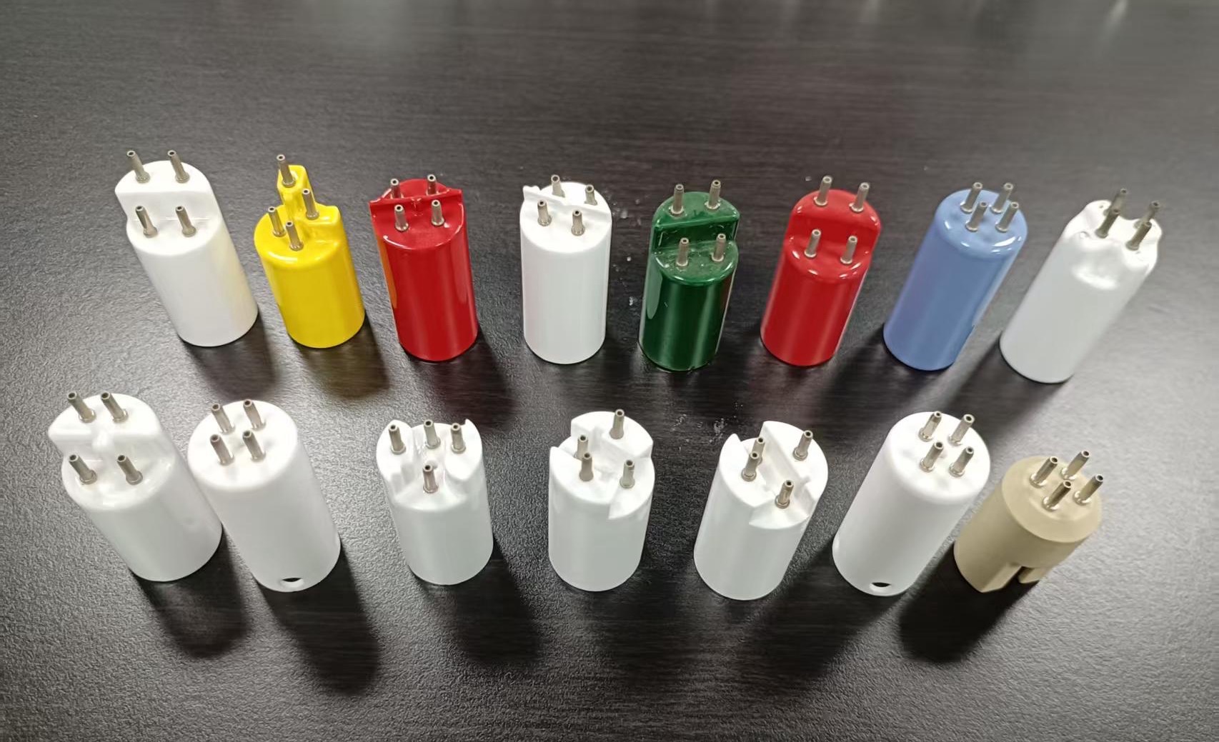 Four-pin UV germicidal lamp cap configurations for water-treatment systems