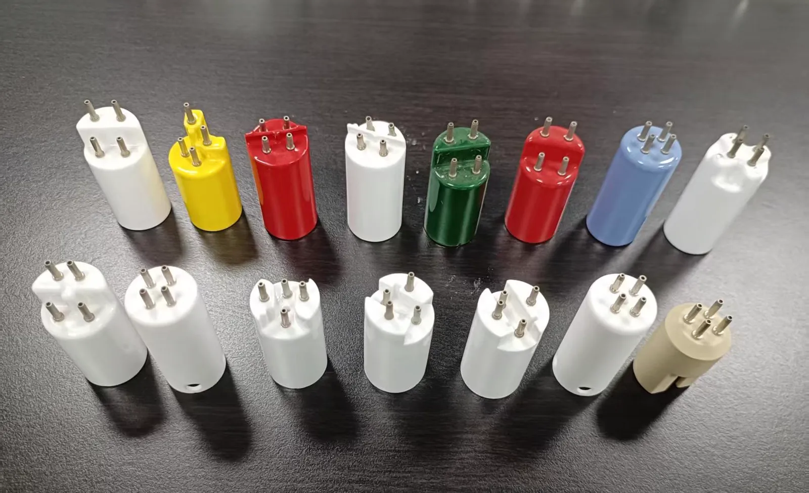 Four-pin UV germicidal lamp cap configurations for water-treatment systems