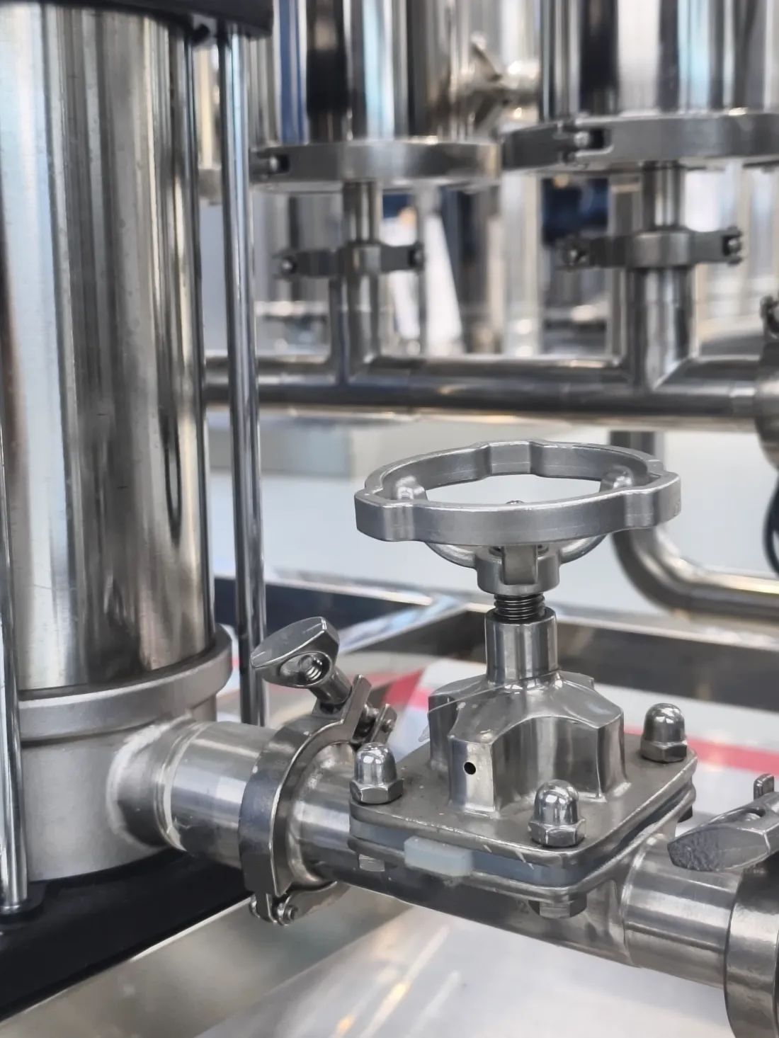 Sanitary diaphragm valve with stainless piping detail on a KONCHE system